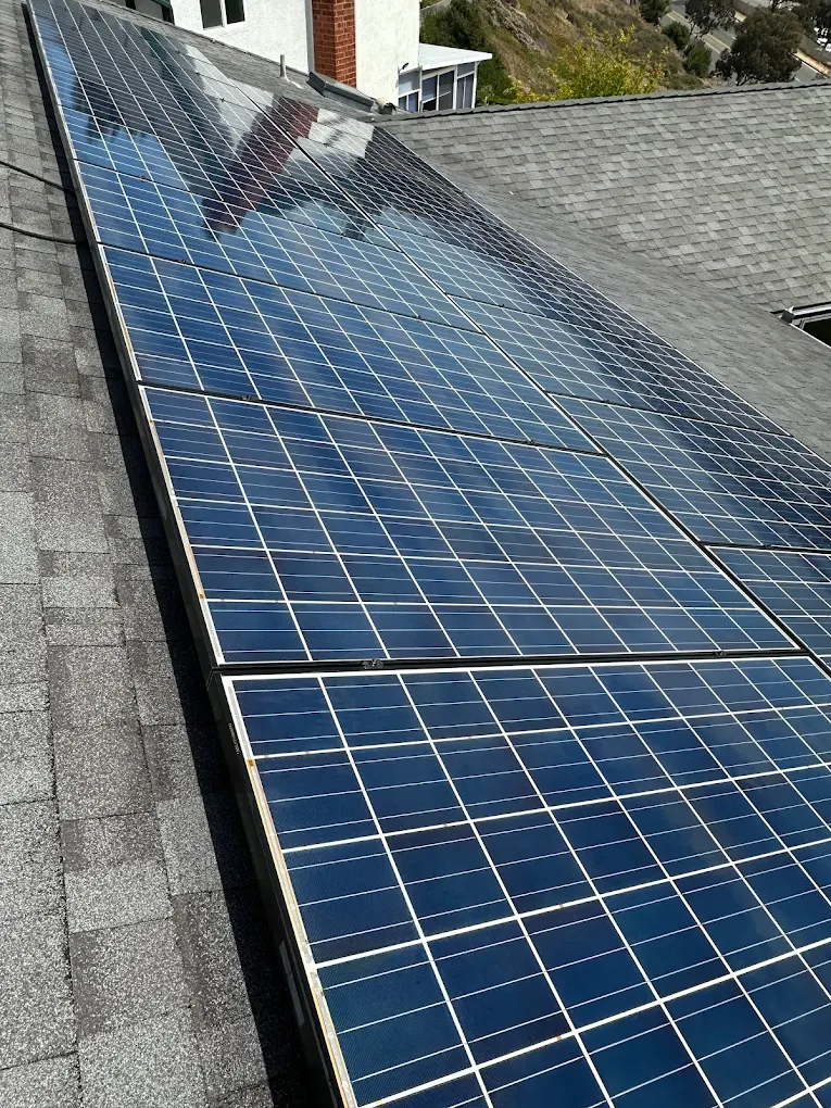 Solar panels after cleaning on residential roof San Diego